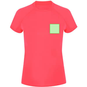 A bright pink women's t-shirt featuring a green square on the front. The shirt has short sleeves and a fitted design.