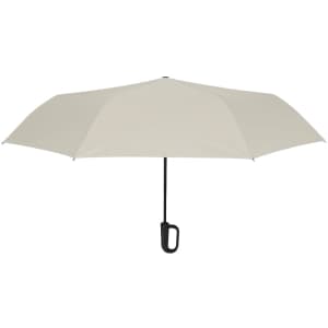 A beige umbrella with a black handle and hook, featuring a simple design.