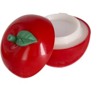 A red apple-shaped lip balm container with a green leaf on top, featuring a white interior.
