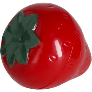 A strawberry-shaped lip balm in bright red with a green leaf on top, featuring a smooth finish and rounded shape.