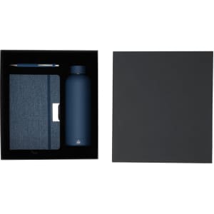 A navy drink bottle, denim notebook, and pen arranged in a black gift box.