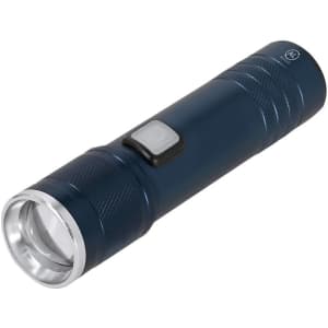 A navy blue torch with a silver bezel and a textured grip, featuring a power button.