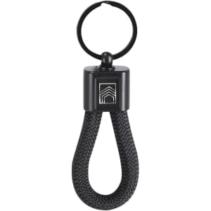 A black keyring with a woven design and a circular attachment point, featuring a logo.