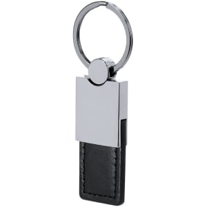 A keyring featuring a chrome finish and a black leather strap, with a circular attachment for keys.