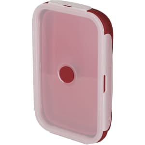 A red and white lunch box with a secure lid and a circular button in the centre, featuring a logo.
