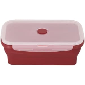 A red lunch box with a pale pink lid and a centre knob, featuring a simple design and a logo.