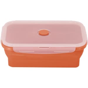 An orange lunch box with a pink lid, featuring a button closure and a sleek design.