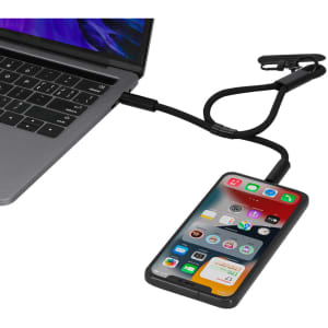 A charging cable in black connected to a laptop and a smartphone, showcasing a sleek design and functionality.