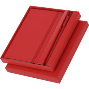 A red notebook set with an elastic band and pen, presented in a matching red box.