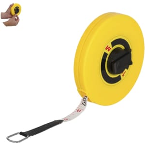 A yellow tape measure retracting, with a black grip and markings in metres. It includes a logo on the side.