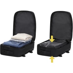 A black vacuum backpack featuring stacked clothes inside, with a zipped compartment for additional storage.