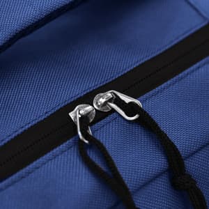 A blue backpack with a zipper and black pull strings, featuring a logo on the fabric.