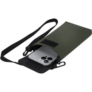 A green Kryan multipurpose bag with a phone partially tucked inside, featuring a strap and branding.