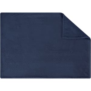 A navy blue Iridian Blanket featuring a textured surface with a soft finish and a folded corner.