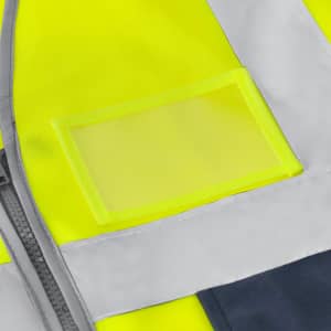 A reflective vest in high visibility yellow with silver reflective strips and a clear pocket. It has a logo.