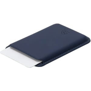 A navy card holder with a sleek design, featuring a subtle logo and a slot for cards.