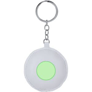 A white keyring featuring a circular design with a green centre and a metal chain attachment.