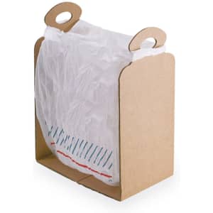 A cardboard holder with two handles, containing a white plastic trash bag.