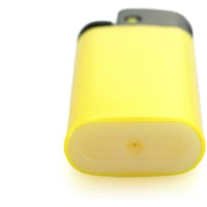 A yellow Minicricket lighter with a grey top and a rounded base, featuring a small logo.