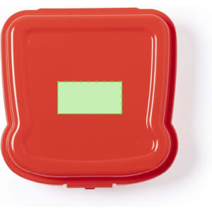 A red lunch box with a smooth surface and rounded edges, featuring a blank area for labelling.