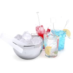 A silver ice bucket with ice, alongside three colourful drinks in glasses: red, blue, and clear with lemon slices.