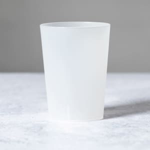 A frosted white plastic cup with a smooth finish, featuring a simple design and a rounded top edge.
