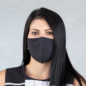 A reusable hygienic mask in black worn by a woman with long black hair, featured against a muted background.