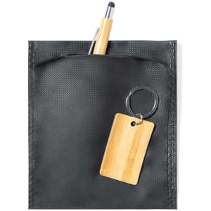 A black pouch features a pen in the pocket and a keyring with a wooden tag attached.
