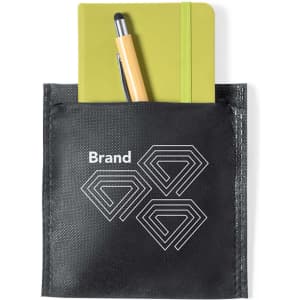 A black pouch containing a green notebook and a yellow pen, featuring a branding logo.