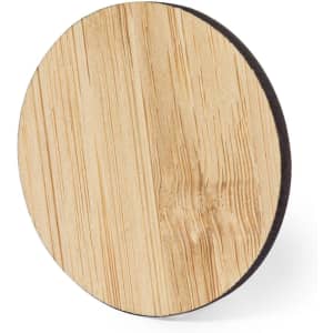 A round wooden lapel pin with a natural wood finish and a darker edge, featuring a simple design.