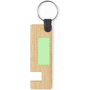 A bamboo keyring featuring a green rectangular area, attached to a metal ring.