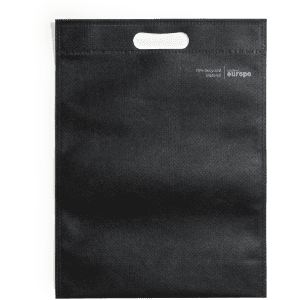 A black tote bag made from 70% recycled material, featuring a handle and a logo.