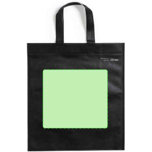 A black tote bag featuring a square green panel. The bag has two handles and includes a logo.
