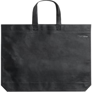 A black reusable grocery bag with two handles and a logo. The material appears durable and sturdy.