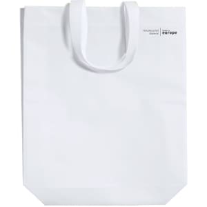 A white reusable grocery bag with handles, featuring a logo and information about recycled materials.