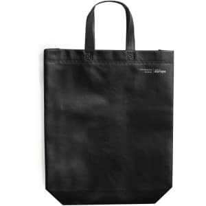 A black reusable grocery bag with two handles and a simple logo. Suitable for carrying various items.