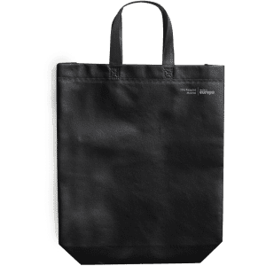 A black reusable grocery bag with two handles and a simple design, featuring a small logo.