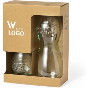 A glass drink bottle and matching glass, presented in eco-friendly packaging with a logo. The bottle has a green tint.