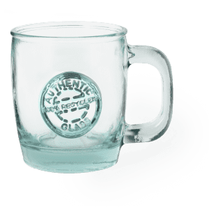 A clear glass mug with a handle, featuring a round embossed logo, made from recycled materials.