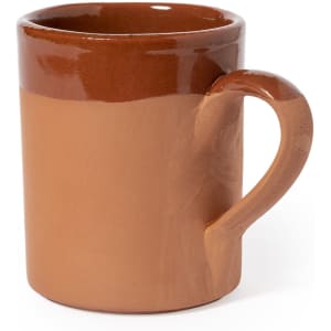 A brown ceramic coffee mug with a glossy finish and a sturdy handle. It features a two-tone design.