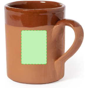 A coffee mug in brown ceramic with a textured finish and a circular handle. It features a blank green area for custom branding.