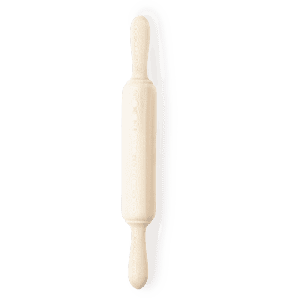 A wooden rolling pin in a light cream colour with decorative patterns and rounded handles.