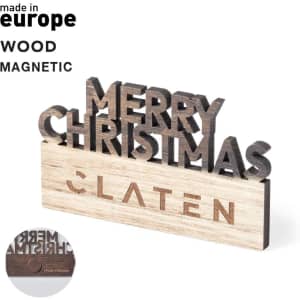A wooden magnetic decoration featuring the text "Merry Christmas," in dark and light brown tones, with a logo.