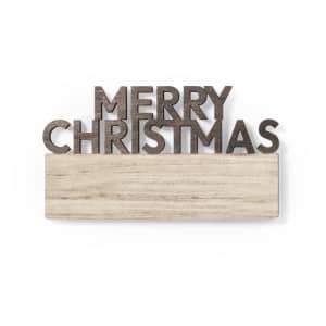 A decorative sign featuring the words "Merry Christmas" in dark letters on a light wooden base.