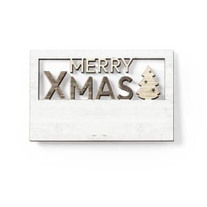 A decorative white magnet featuring the words "MERRY" and "XMAS" alongside a Christmas tree design.