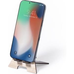 A phone stand made of wood supporting a sleek black smartphone with a colourful display. The stand has a minimalist design.