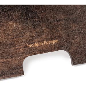 A dark wooden phone stand with a smooth finish and a logo. It features a cutout for device placement.