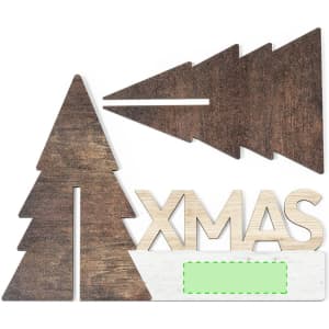 A wooden Christmas decoration featuring trees and the word "XMAS" in natural and dark wood tones.
