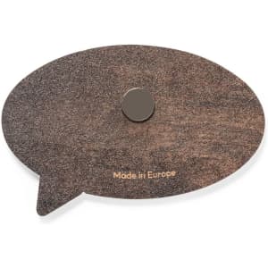 A brown speech bubble-shaped magnet featuring a round metal component on the back. It has a logo.