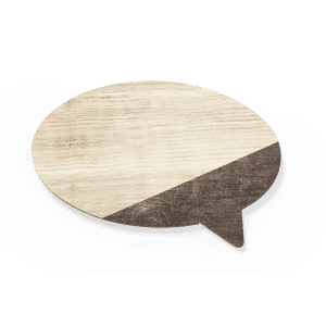 A speech bubble-shaped magnet in wood textures, featuring light and dark brown colours. It has a logo present.